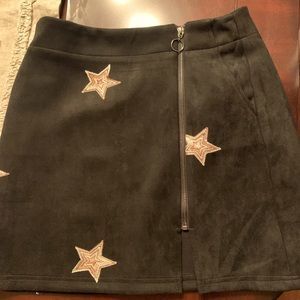 Faux black suede skirt with embroidery gold stars.
